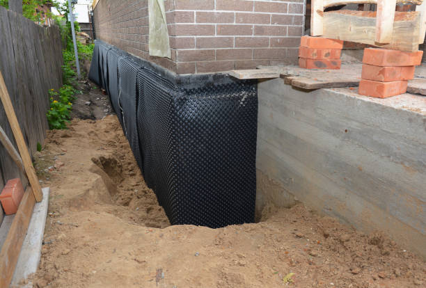 Happy homeowners after waterproofing job in Victoria